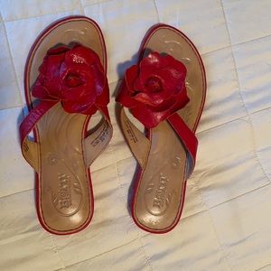 Born red flower flip flop sandals.